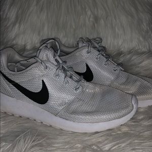 Grey Nike roshes